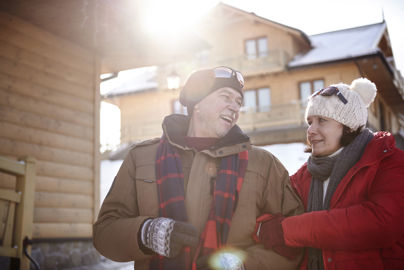 happy mature couple in mountain village in winter 2022 03 08 01 02 26 utc
